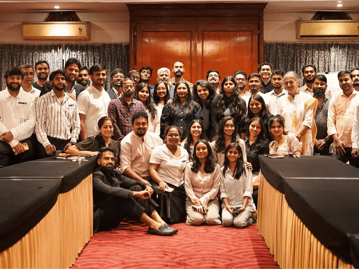 Toastmasters club members gathered for a meeting indoors in Bangalore